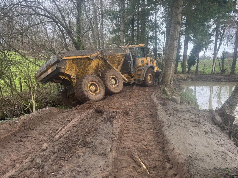 Pic 6 Dumper sliding in ditch.jpeg